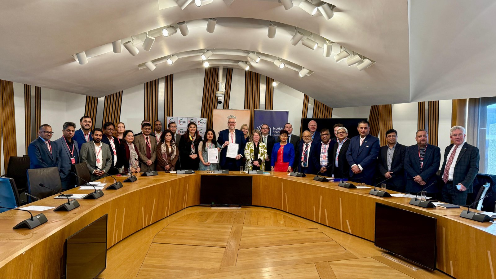 Consul General attended the signing ceremony of MoU between FICCI & Scottish Financial Enterprise at the Scottish Parliament