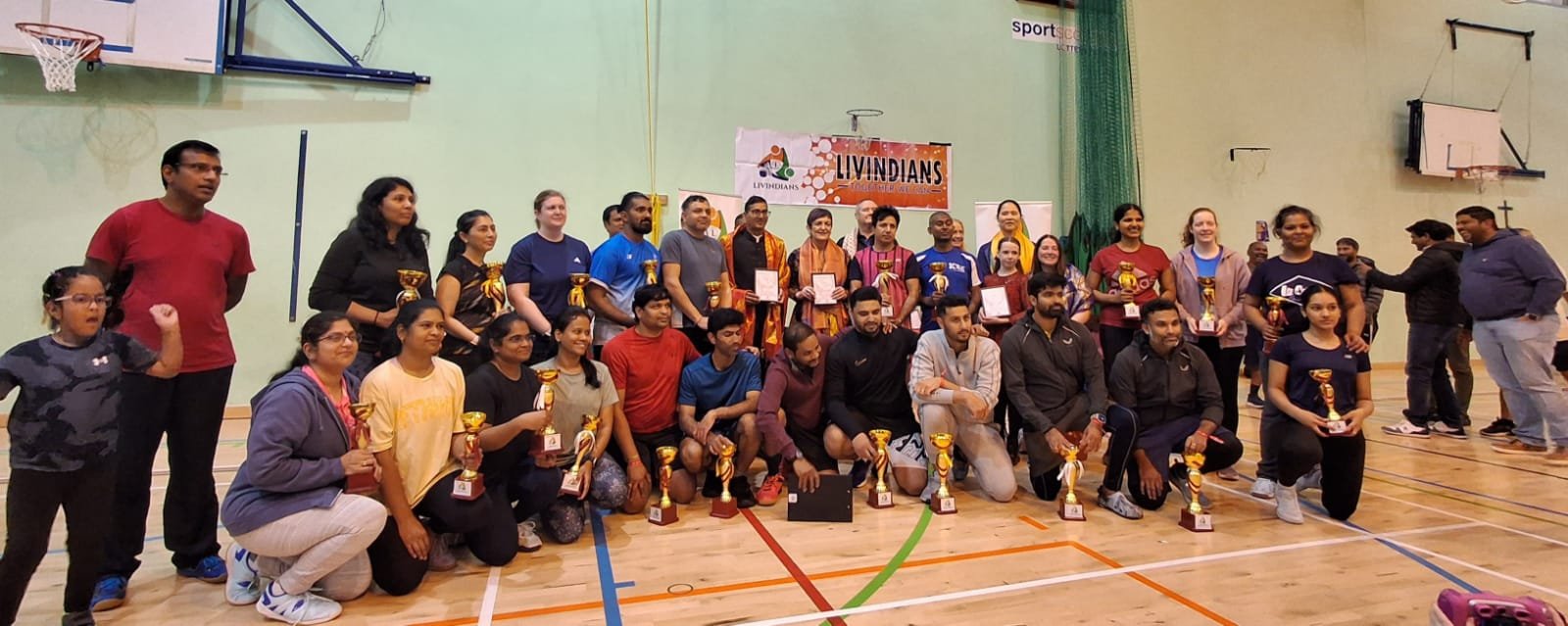 Consul awarded prizes to the winners and participants at the badminton tournament